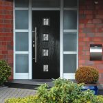 Black front door in composite