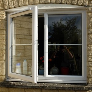 Replacement casement windows with glazing astragal bar