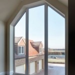 Large ceiling to floor glass windows with angular panes - custom windows home exterior ideas