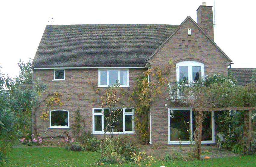 Brick house in the Gloucestershire countryside