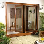 Oak colour bifold door in uPVC material