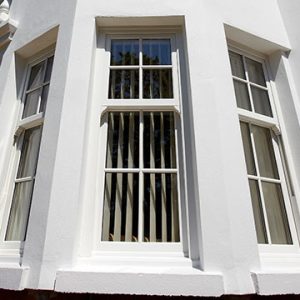 A uPVC double glazed window that looks like a sliding sash window