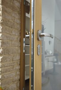 Origin bifold door locking mechanism